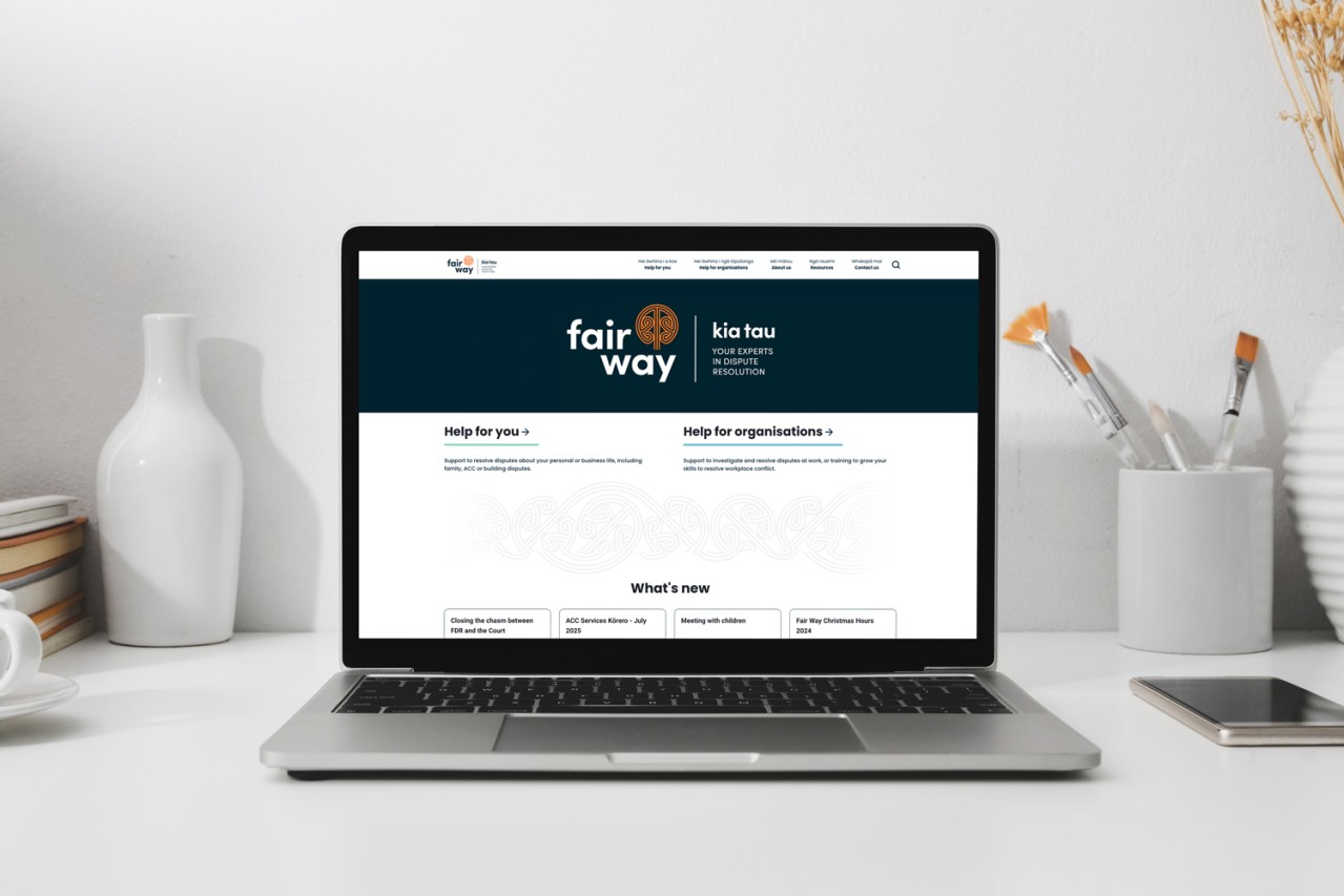 fairwayresolution.com website shown on a laptop on a desk